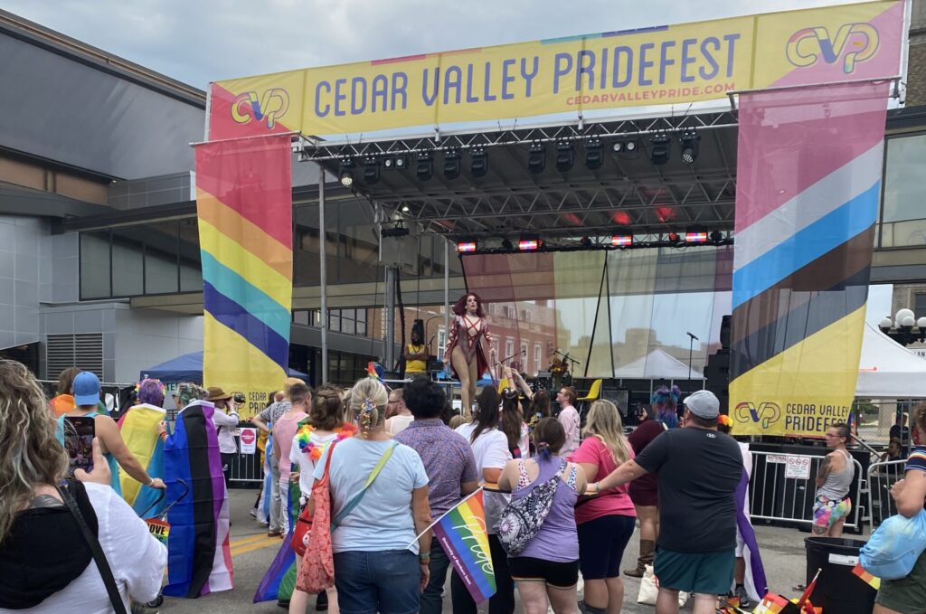 A drag queen performs on the Main Stage at the 2022 Cedar Valley Pridefest, August 27, 2022.